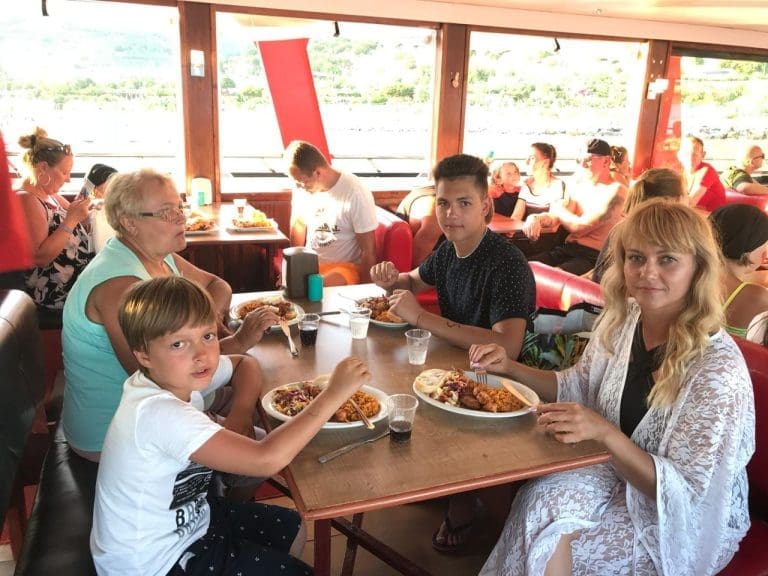 Family having BBQ lunch on Alanya pirate ship tour with sea view